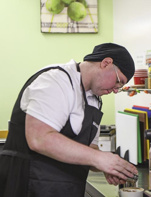Luci Rachel working at Lily and Lime cafe in Portsmouth Central Library
